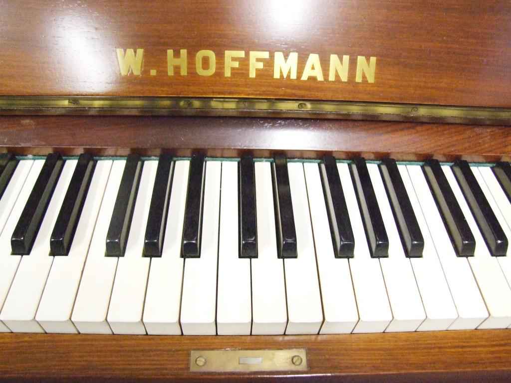 Genuine original Hoffmann upright pianos are distinguished from other makers who use similar names as the original Hoffmann always has a brass inlaid name; others use stencils.